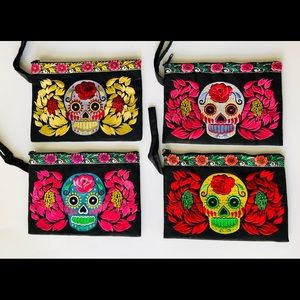 Skull embroidered wristlet/clutch